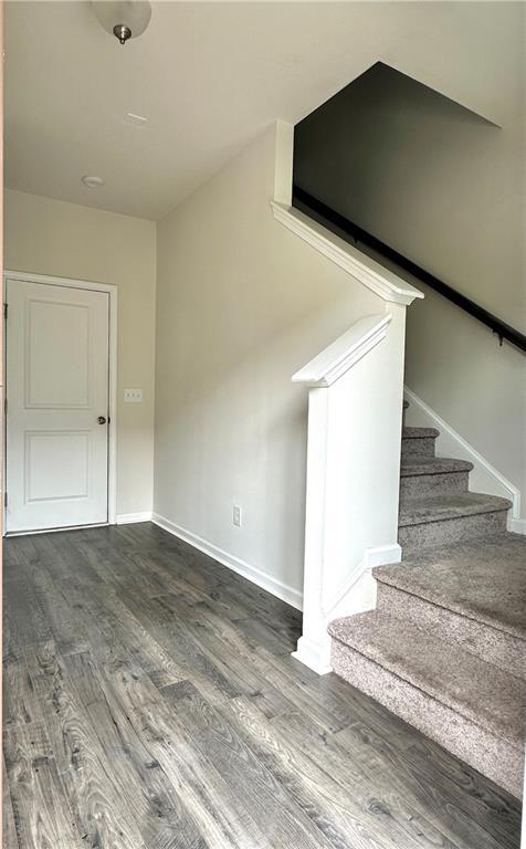 3658 Hidden Valley Cir, Lawrenceville, GA 30044 - interior space featuring baseboards and wood finished floors