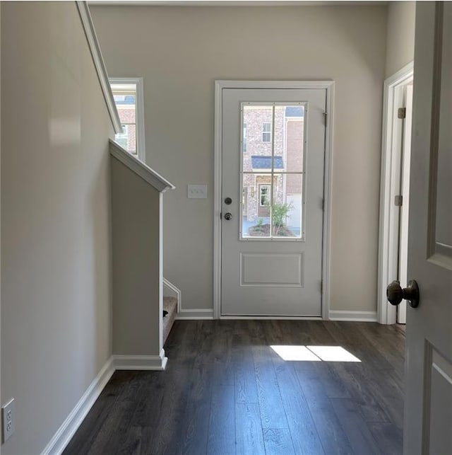3658 Hidden Valley Cir, Lawrenceville, GA 30044 - doorway to outside with baseboards, a wealth of natural light, stairs, and dark wood-style flooring