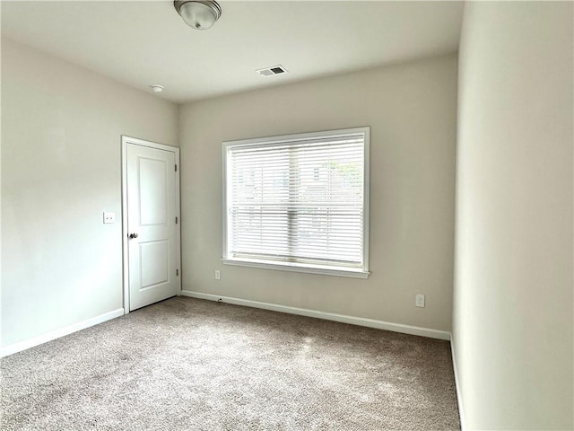 3658 Hidden Valley Cir, Lawrenceville, GA 30044 - unfurnished room featuring carpet floors, visible vents, and baseboards
