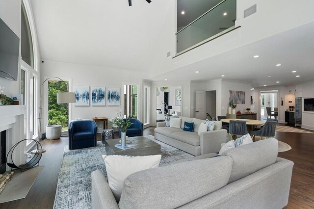 330 Longvue Ct, Johns Creek, GA 30097 - living room featuring a high ceiling, wood finished floors, recessed lighting, and a fireplace
