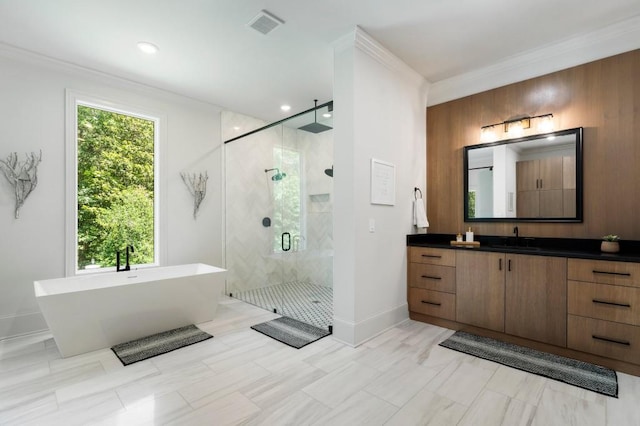 330 Longvue Ct, Johns Creek, GA 30097 - bathroom featuring a shower stall, a freestanding bath, vanity, crown molding, and baseboards