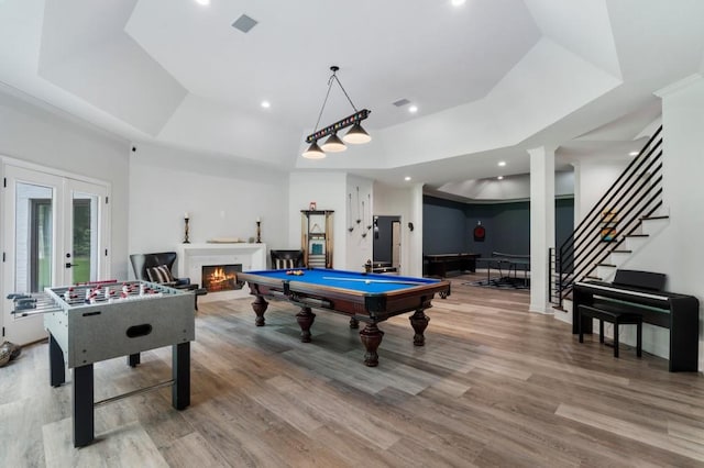 330 Longvue Ct, Johns Creek, GA 30097 - playroom with pool table, a lit fireplace, a raised ceiling, wood finished floors, and recessed lighting