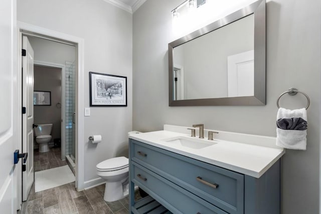 330 Longvue Ct, Johns Creek, GA 30097 - full bathroom with toilet, ornamental molding, vanity, a shower stall, and baseboards