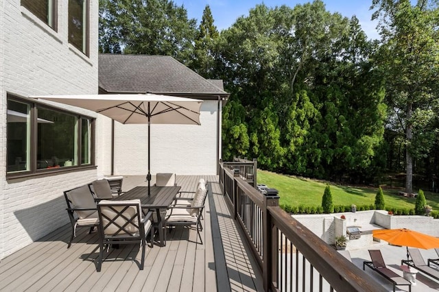 330 Longvue Ct, Johns Creek, GA 30097 - deck with outdoor dining area, a yard, and view of wooded area