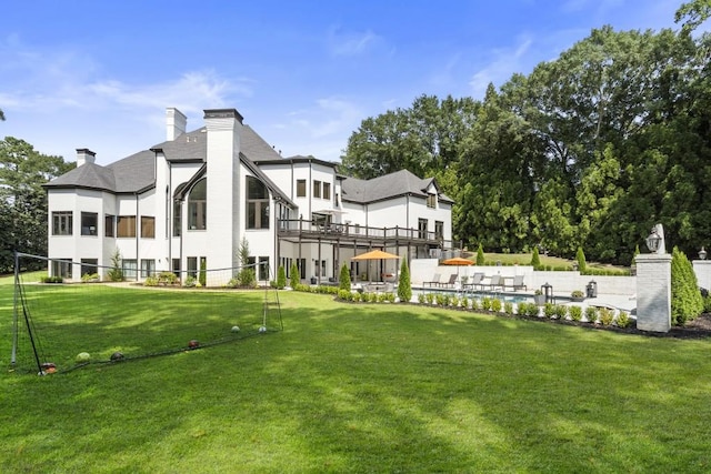 330 Longvue Ct, Johns Creek, GA 30097 - back of property with a chimney and a yard