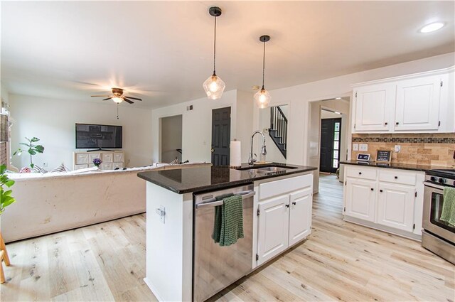 4222 Honey Creek Way, Powder Springs, GA 30127 - kitchen featuring white cabinetry, light wood-type flooring, stainless steel appliances, and a sink