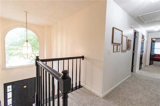 4222 Honey Creek Way, Powder Springs, GA 30127 - hall with a textured ceiling, attic access, a wealth of natural light, and carpet
