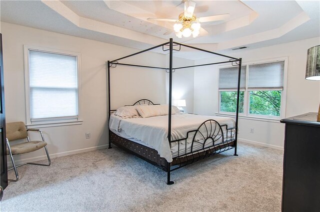 4222 Honey Creek Way, Powder Springs, GA 30127 - carpeted bedroom with visible vents, ceiling fan, a raised ceiling, and baseboards