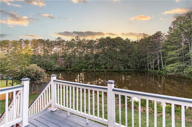 4222 Honey Creek Way, Powder Springs, GA 30127 - deck at dusk featuring a water view