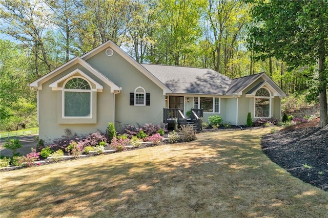 1819 Yorkshire Dr, Woodstock, GA 30189 - single story home with a front yard, a shingled roof, and stucco siding