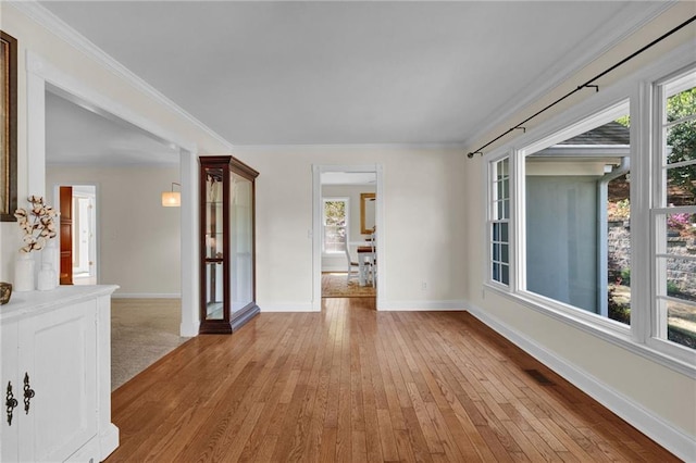 1819 Yorkshire Dr, Woodstock, GA 30189 - spare room featuring hardwood / wood-style flooring, baseboards, and crown molding