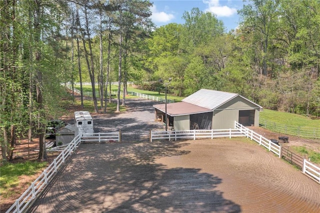 1819 Yorkshire Dr, Woodstock, GA 30189 - surrounding community with an outbuilding, an exterior structure, and a wooded view