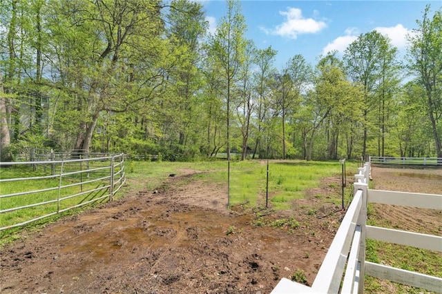 1819 Yorkshire Dr, Woodstock, GA 30189 - view of yard featuring a forest view and fence