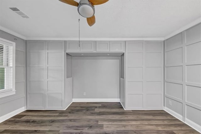 interior space with ceiling fan and dark hardwood / wood-style flooring