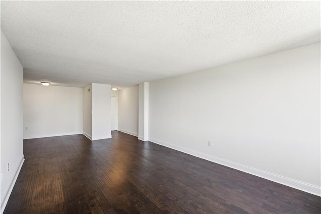 2479 Peachtree Rd NE Unit 1703, Atlanta, GA 30305 - spare room with dark wood-style floors and a textured ceiling