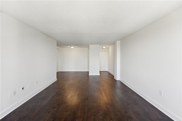 2479 Peachtree Rd NE Unit 1703, Atlanta, GA 30305 - spare room with dark wood-type flooring and baseboards