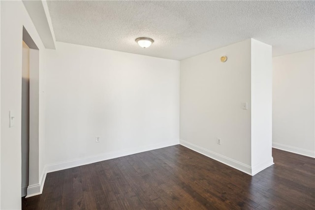 2479 Peachtree Rd NE Unit 1703, Atlanta, GA 30305 - empty room with dark wood-type flooring and a textured ceiling