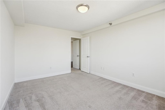 2479 Peachtree Rd NE Unit 1703, Atlanta, GA 30305 - carpeted empty room with baseboards
