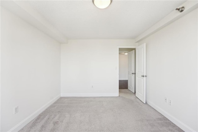 2479 Peachtree Rd NE Unit 1703, Atlanta, GA 30305 - spare room featuring light carpet and baseboards