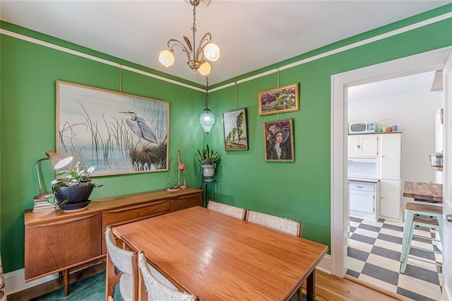 2669 Jefferson Ter, East Point, GA 30344 - dining room with a chandelier and wood finished floors
