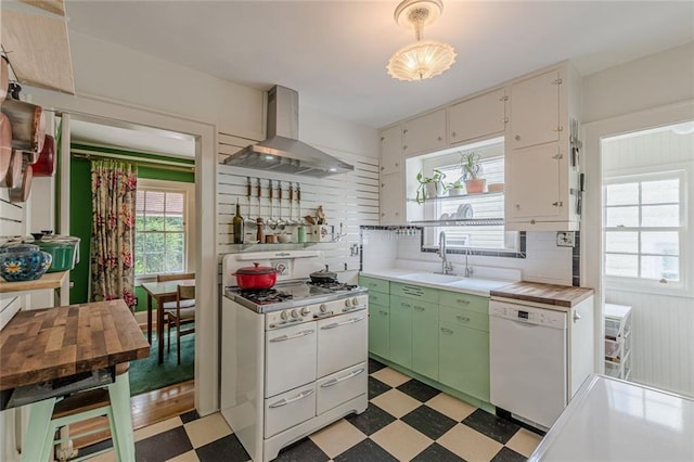 2669 Jefferson Ter, East Point, GA 30344 - kitchen featuring ventilation hood, white appliances, light flooring, and healthy amount of natural light