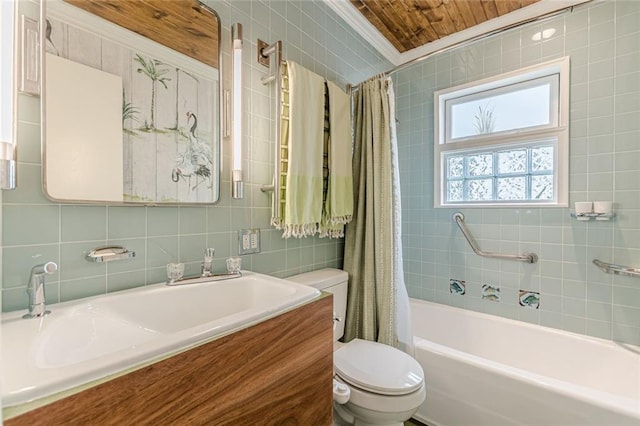 2669 Jefferson Ter, East Point, GA 30344 - bathroom featuring toilet, shower / tub combo, tile walls, vanity, and backsplash