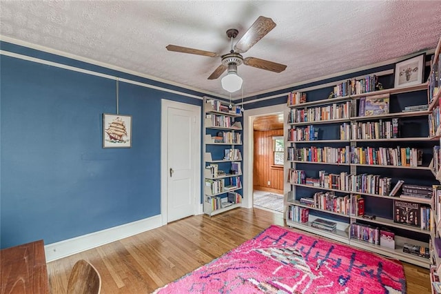 2669 Jefferson Ter, East Point, GA 30344 - sitting room with a textured ceiling, ceiling fan, baseboards, and wood finished floors