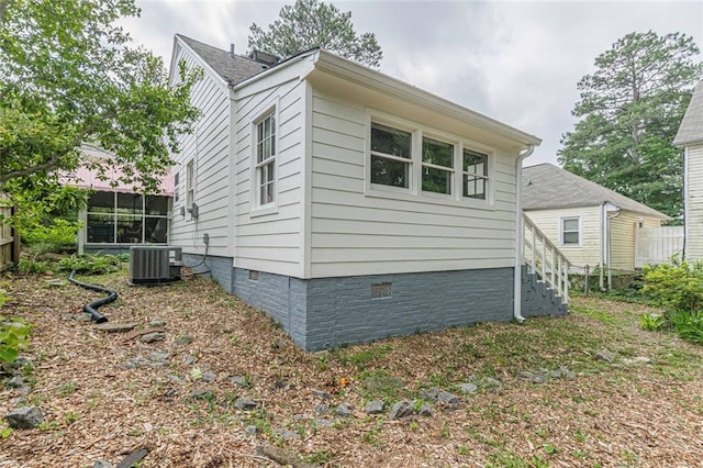 2669 Jefferson Ter, East Point, GA 30344 - view of property exterior with crawl space and central AC unit