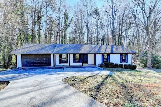 ranch-style home with a garage