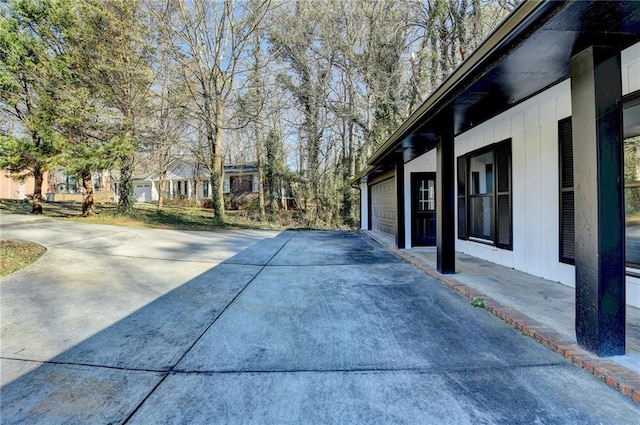 view of side of property featuring a garage