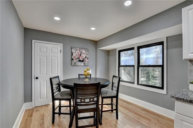 dining room with light hardwood / wood-style flooring