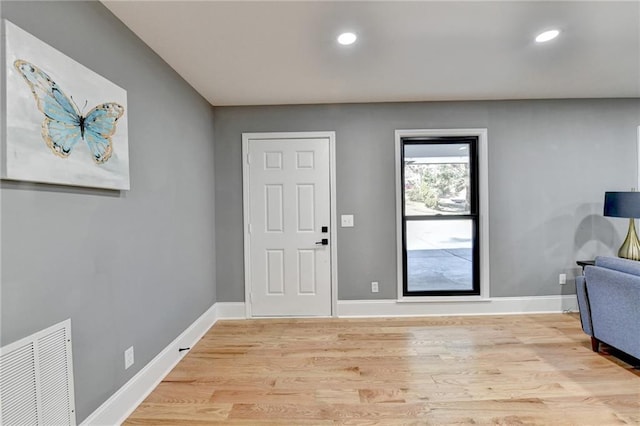 foyer entrance featuring light hardwood / wood-style flooring