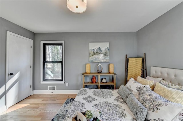 bedroom featuring light hardwood / wood-style flooring