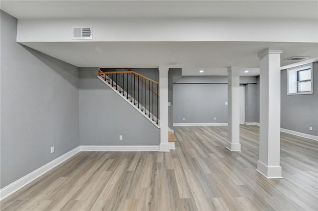 basement featuring light wood-type flooring