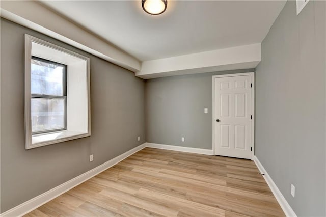 unfurnished room featuring light wood-type flooring