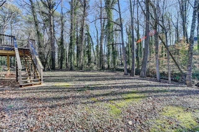 view of yard with a deck