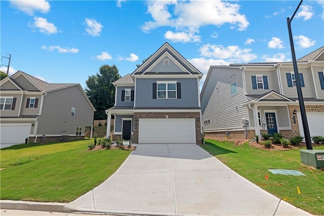 view of front of house featuring a front yard and a garage