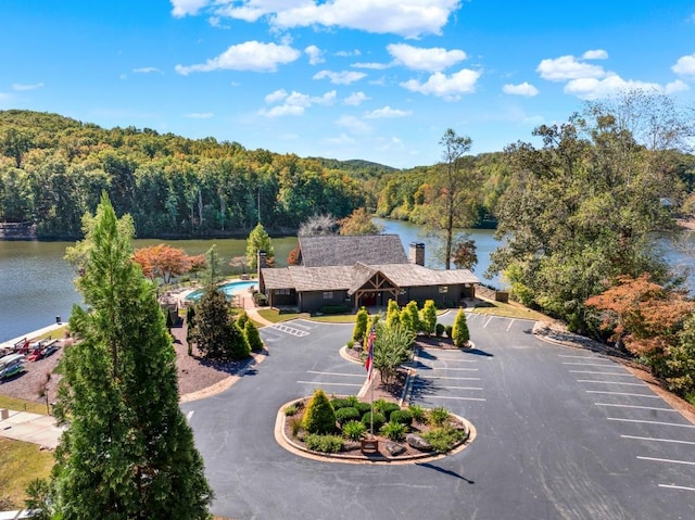 birds eye view of property featuring a water view