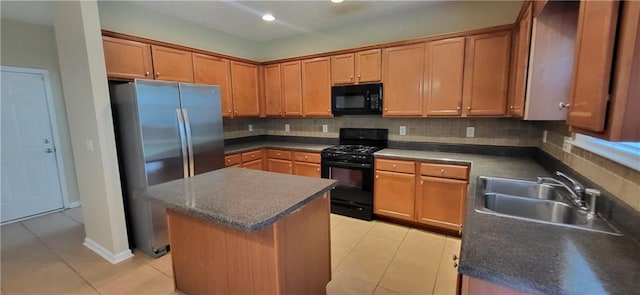 571 Cold Water Ln, Mcdonough, GA 30252 - kitchen with black appliances, light tile patterned floors, decorative backsplash, dark countertops, and recessed lighting
