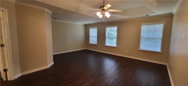 571 Cold Water Ln, Mcdonough, GA 30252 - empty room featuring dark wood-style floors, ornamental molding, and a ceiling fan