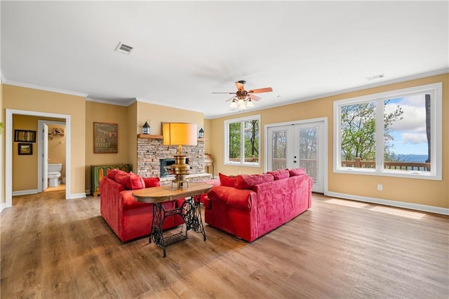 3756 Monument Rd, Jasper, GA 30143 - living area featuring ornamental molding, french doors, a ceiling fan, wood finished floors, and baseboards