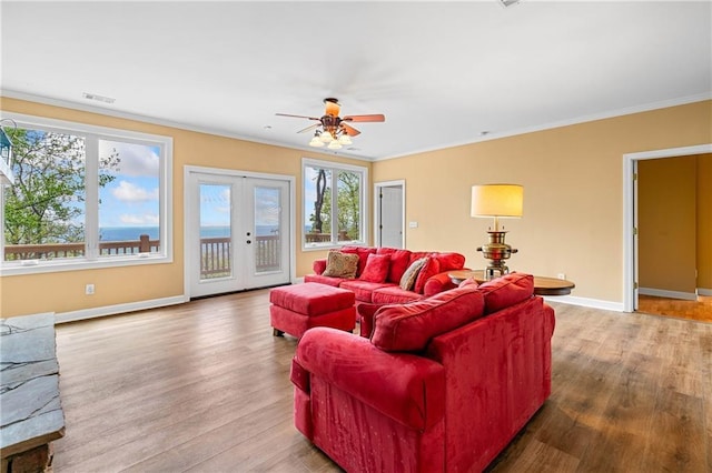 3756 Monument Rd, Jasper, GA 30143 - living area featuring crown molding, wood finished floors, ceiling fan, and baseboards