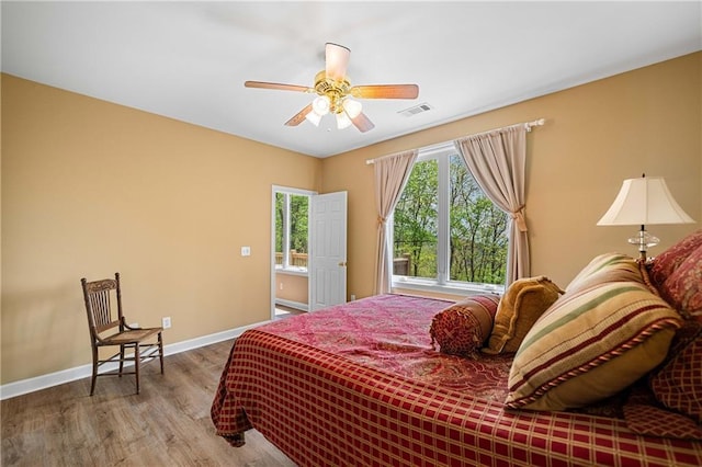 3756 Monument Rd, Jasper, GA 30143 - bedroom featuring wood finished floors, baseboards, and ceiling fan