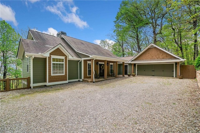 3756 Monument Rd, Jasper, GA 30143 - view of front of property featuring driveway, fence, roof with shingles, a chimney, and a garage