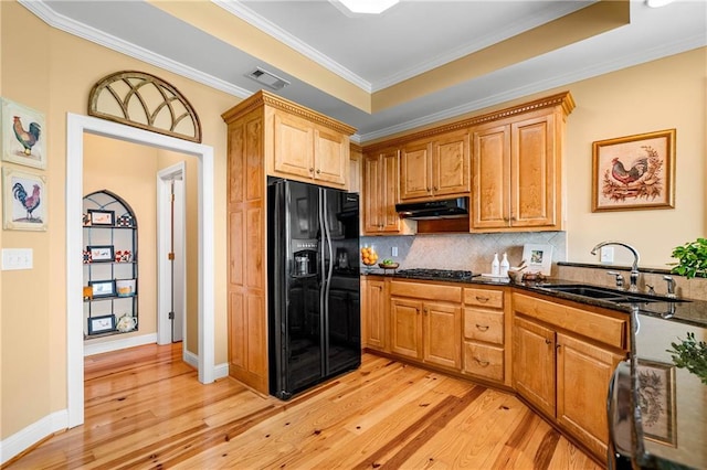 3756 Monument Rd, Jasper, GA 30143 - kitchen with black refrigerator with ice dispenser, under cabinet range hood, a sink, light wood-style floors, and crown molding