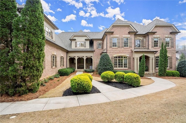 view of front of home with brick siding