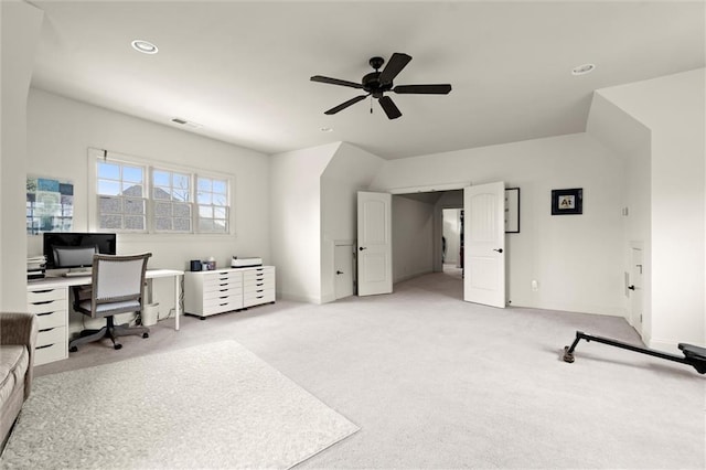 office area with light carpet, baseboards, and a ceiling fan