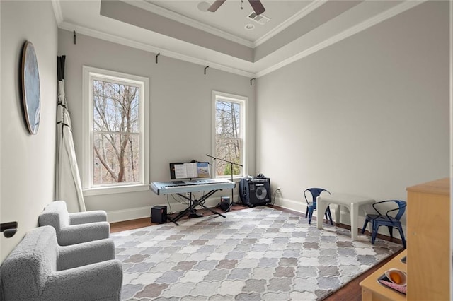 bathroom featuring tile patterned floors, a sink, crown molding, and a tile shower