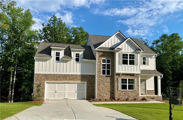 view of front of property with board and batten siding, stone siding, concrete driveway, a front yard, and an attached garage