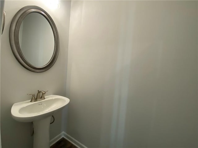 bathroom featuring baseboards